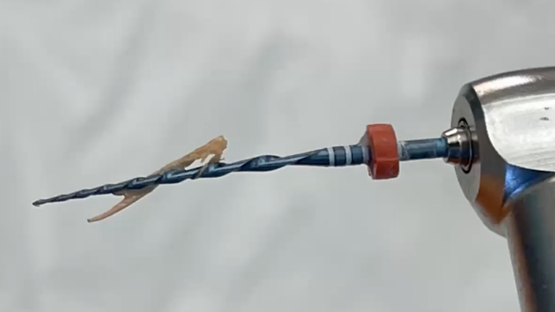 Removal of filling materials and treatment of ledges and apical